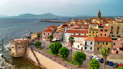 Aerial perspective of Alghero, showcasing the Mediterranean beauty on a warm afternoon