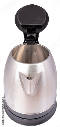 The interior of a metal kettle used for heating water in a household. Isolated background.