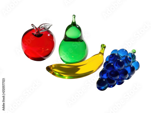 Colorful glass fruit collection with apple pear banana and grapes