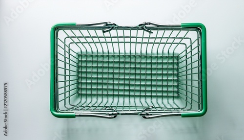 green wire shopping basket from top view supermarket grocery container for retail purchases white background