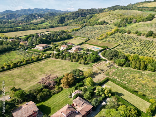 Quadro su tela Aerial view of luxury villa estate and olive grove in Italy for travel marketing