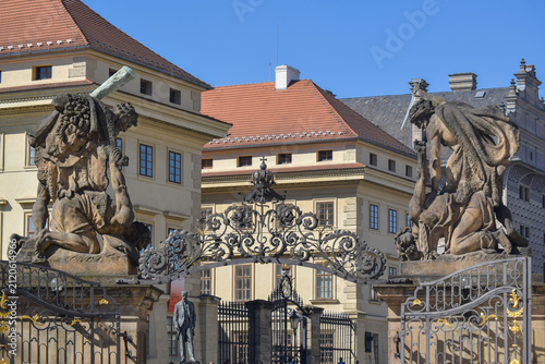 The Gate of the Giants with sculptures of wrestling Titans photographed from from the courtyard of Prague Castle