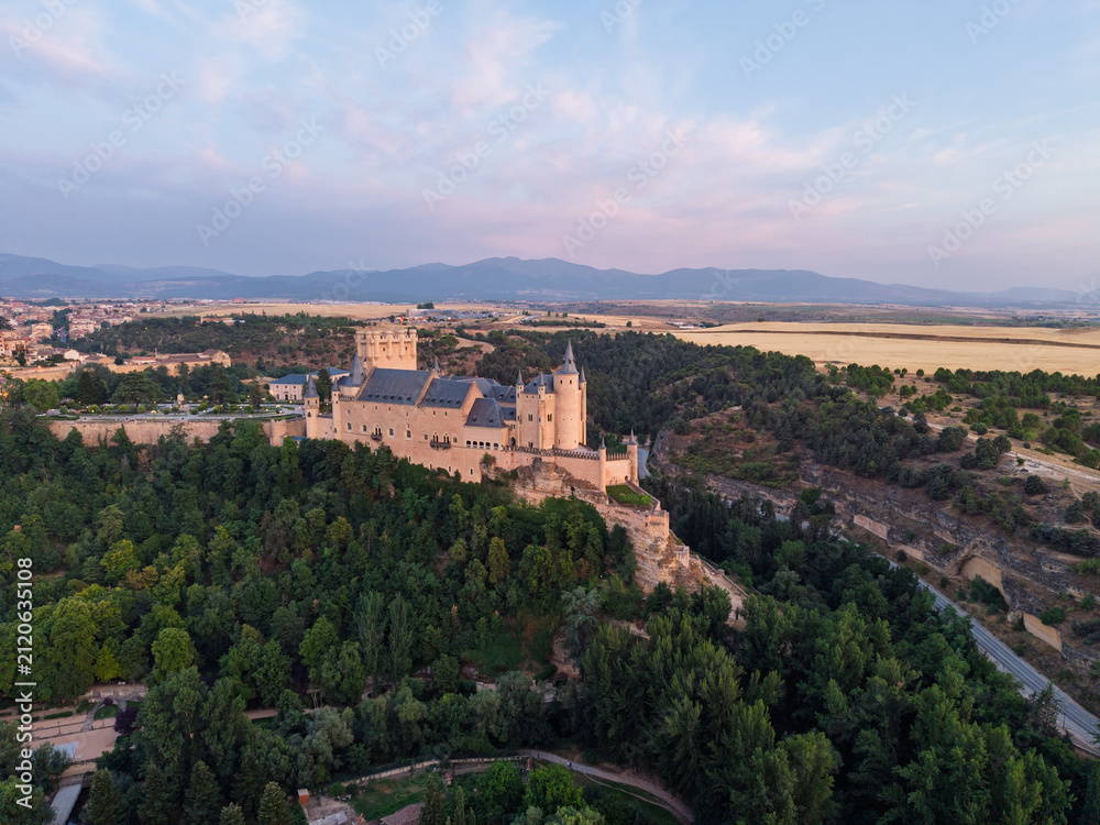 Obraz premium Segovia, spain; 07 25 2026 alcázar of segovia castle at sunset aerial view