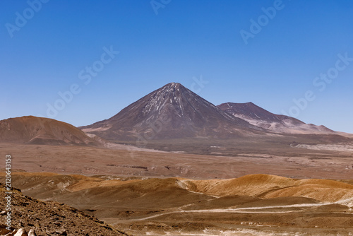Obraz na plátne Licancabur volcano rising above the arid atacama desert landscape in chile, show