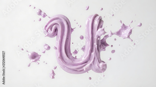 Letter U sculpted from creamy purple frosting creates a decorative element for food design projects.