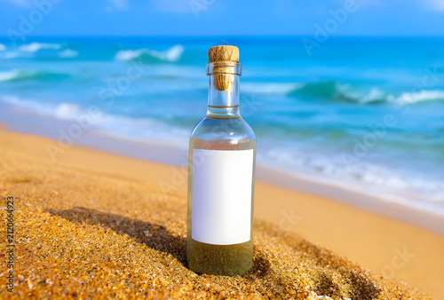 Glass bottle with a blank w...