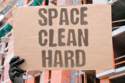 Принти на полотні "Space Clean Hard" Removing debris remains technically difficult