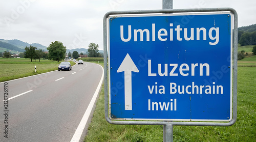 Swiss road detour sign for Luzern and Buchrain.