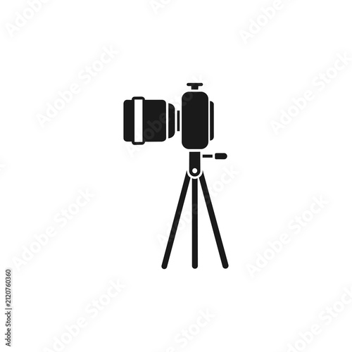 Foto A black vector icon depicting a professional DSLR camera with a telephoto lens mounted on a sturdy tripod stand, set against a plain white background