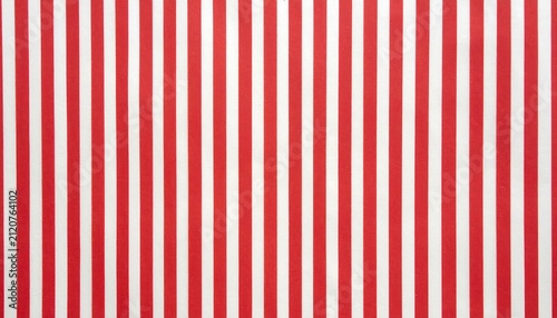 A close-up view presents a pattern of alternating vertical stripes in vibrant red and pristine white