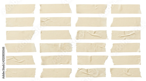 Set of beige masking tape strips with torn edges isolated on a black background for collage design