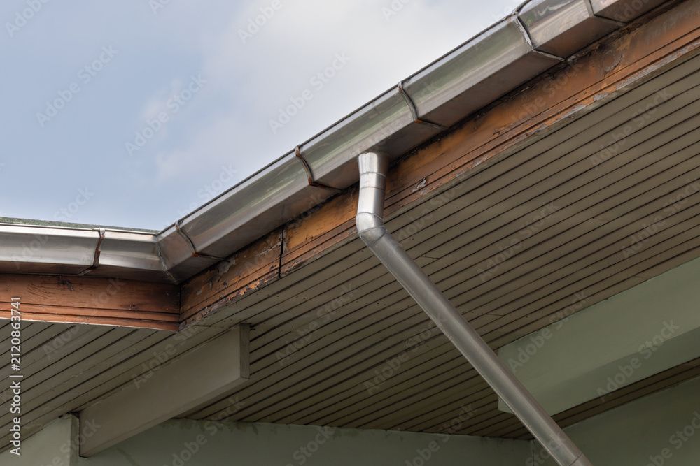 Fototapeta premium House gutter and downpipe in close-up view