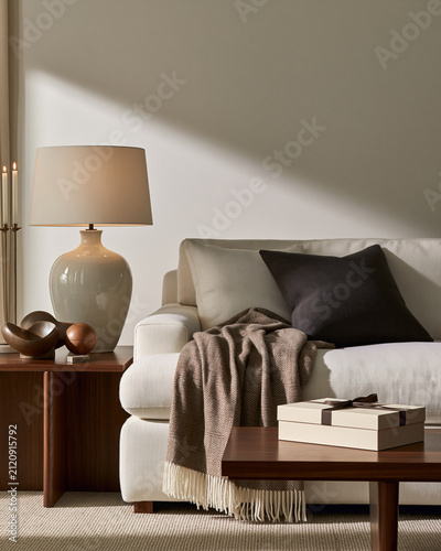 Quiet luxury living room with throw lamp sculptural decor and shopping box showcasing Black Friday home upgrade and refined interior refresh