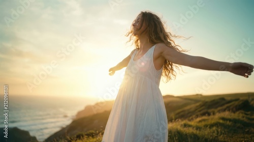 Free Happy Woman Enjoying Nature. Beauty Girl Outdoor. Freedom concept. Beauty Girl over Sky and Sun. Sunbeams. Enjoyment