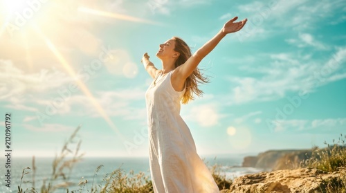 Free Happy Woman Enjoying Nature. Beauty Girl Outdoor. Freedom concept. Beauty Girl over Sky and Sun. Sunbeams. Enjoyment
