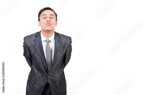 Obraz na plátne Loving man in suit sending air kiss