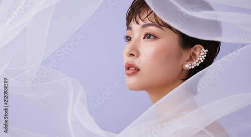 Asian Female Beauty Close Up Portrait with Elegant Pearl Jewelry