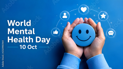Hands holding a blue smiley face icon for World Mental Health Day celebration.