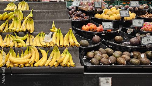 Konstfotografi Supermarket produce aisle displaying fresh fruits for sale
