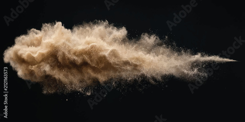 Konstfotografi Dynamic burst of golden sand particles isolated on black background with explosi