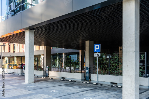 Electric Vehicle Charging Station Parking Garage Modern Office Building Sustainable Mobility