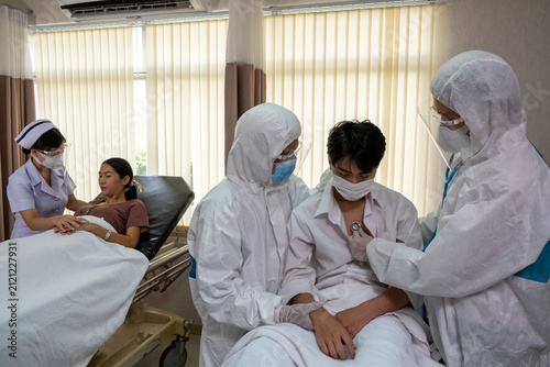 Medical care epidemic hospital patient nurse doctor mask protective suit examination clinic treatment health safety emergency