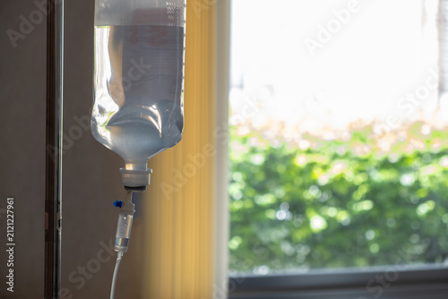 Obraz na plátne Intravenous drip hospital infusion saline bottle medical treatment epidemic pati