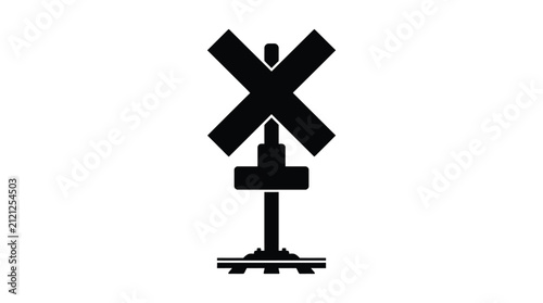 Quadro su tela Railroad crossing sign warns drivers of an approaching train track intersection