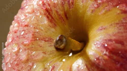 Fresh Red Apple with Water Droplets on Its Skin