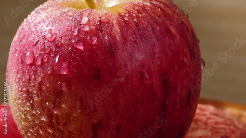 Fresh Red Apple with Water Droplets on Its Skin