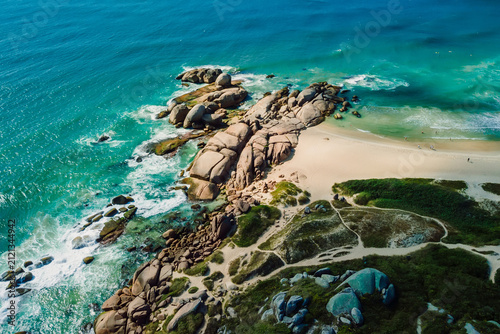 Coastline with Mole beach, rocks and ocean waves in Brazil.