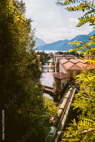 Panoramic lakeside village on Lake Como powered by the Bellano hydroelectric plant