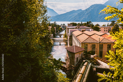 Panoramic view of the Bellano hydroelectric plant above Lake Como shoreline