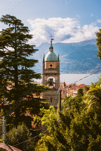 Picturesque campanile overlooking the mountains and shoreline of Lake Como