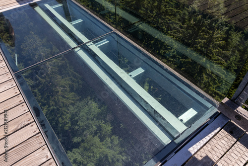Foto glass floor on the treetop walk (Stezka korunami stromu) on sunny days in South