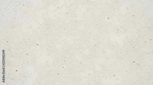 Seamless textured light grey concrete background with subtle speckles