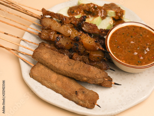 Obraz na płótnie Sate Kere is popular street food in Java, Indonesia, made from grilled tempeh an