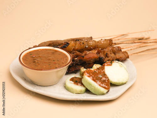 Obraz na płótnie Sate Kere is popular street food in Java, Indonesia, made from grilled tempeh an
