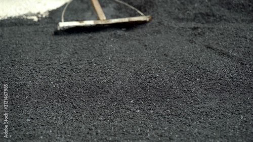 Paving Rake Smoothing Fresh Asphalt Road Surface