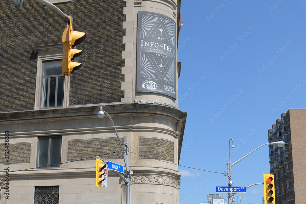 Fototapeta premium wall mounted banner sign of Info-Tech Research Group located at 888 Yonge St, also known as The Masonic Temple / The Concert Hall, Toronto
