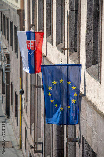 European Union ,EU flag together with Slovak Flag on the building.