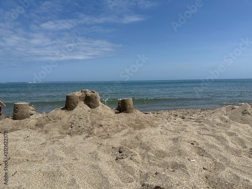 Sand castle building on a beach with sea view