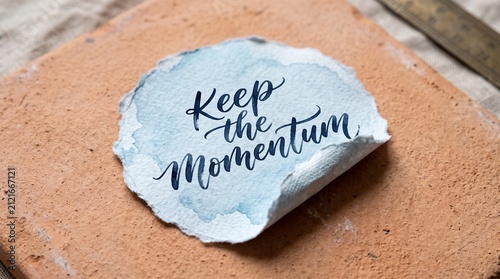 Foto Keep the momentum motivational rock