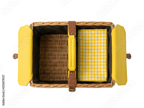 Overhead view of an open wicker picnic basket with yellow gingham liner and leather straps isolated on transparent background