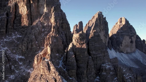 Flying near Monte Paterno towards famous Tre Cime Lavaredo mountain in the italian Dolomites