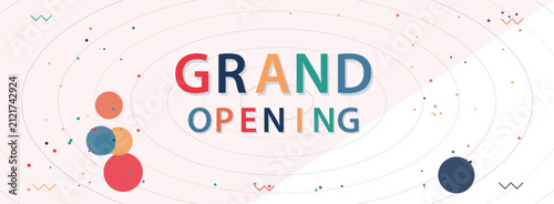 Grand opening banner with colorful circles and lines
