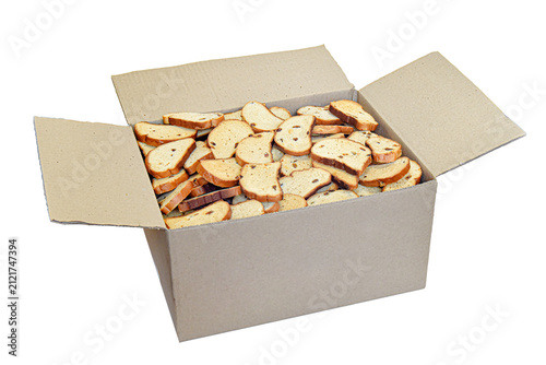 Obraz na płótnie Cardboard Box Filled with Sweet Toast Rusks Isolated PNG