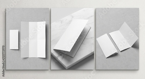 A wide three-panel mockup presentation featuring blank white matte tri-fold brochures on marble and light gray surfaces with soft natural shadows.
