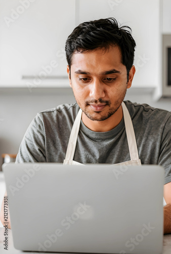 Young indian man wearing an...
