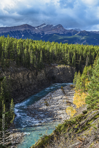 Beautiful natural landscape of mountain covered river.